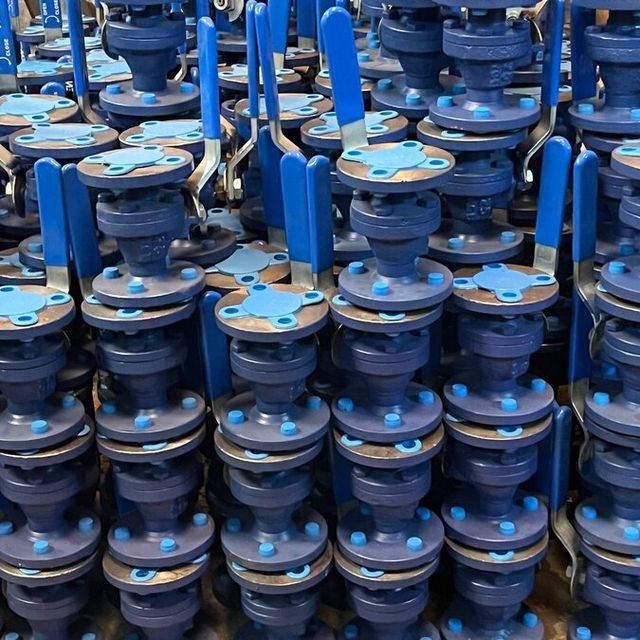 Rows of lever-operated ball valves in the works